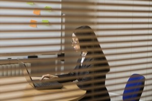 Woman working in a Sensitive Compartmented Information Facility