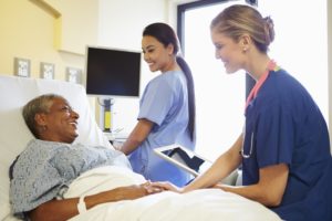 two nurses respond to a nurse call system request from a patient